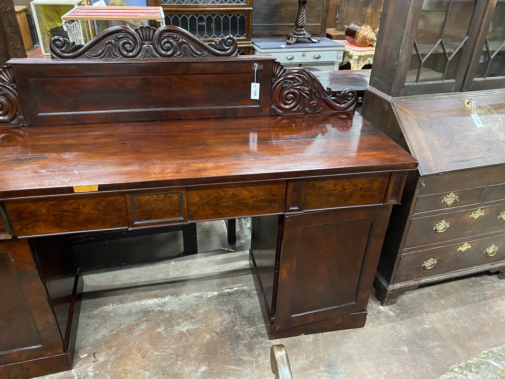 An early Victorian mahogany pedestal sideboard, length 190cm, depth 56cm, height 132cm